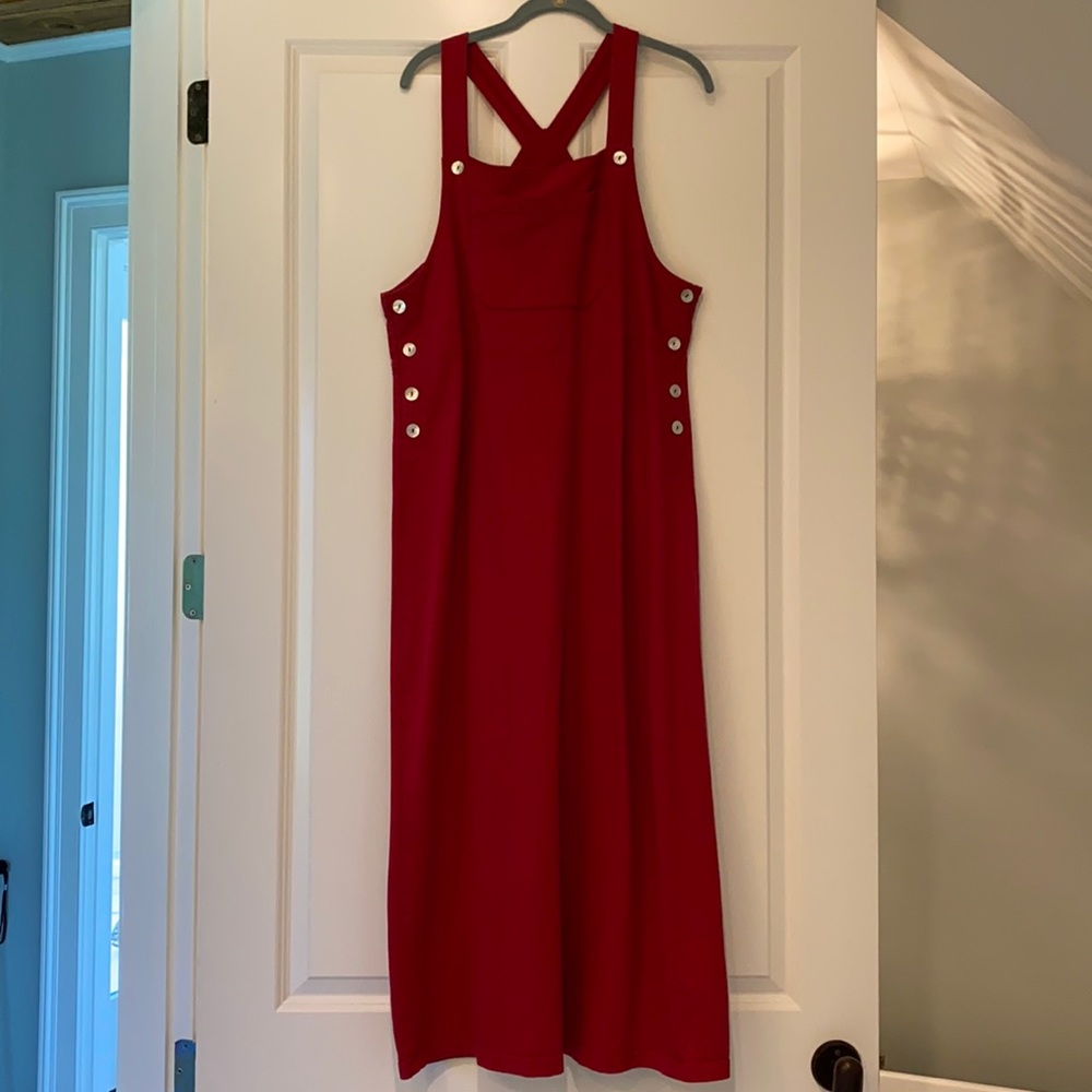 Red “over-all” style dress; pearl button sides